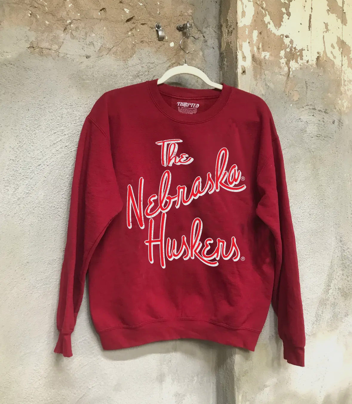 Vintage-inspired Red Nebraska Huskers Beverly sweatshirt with distressed details and 100% preshrunk cotton.