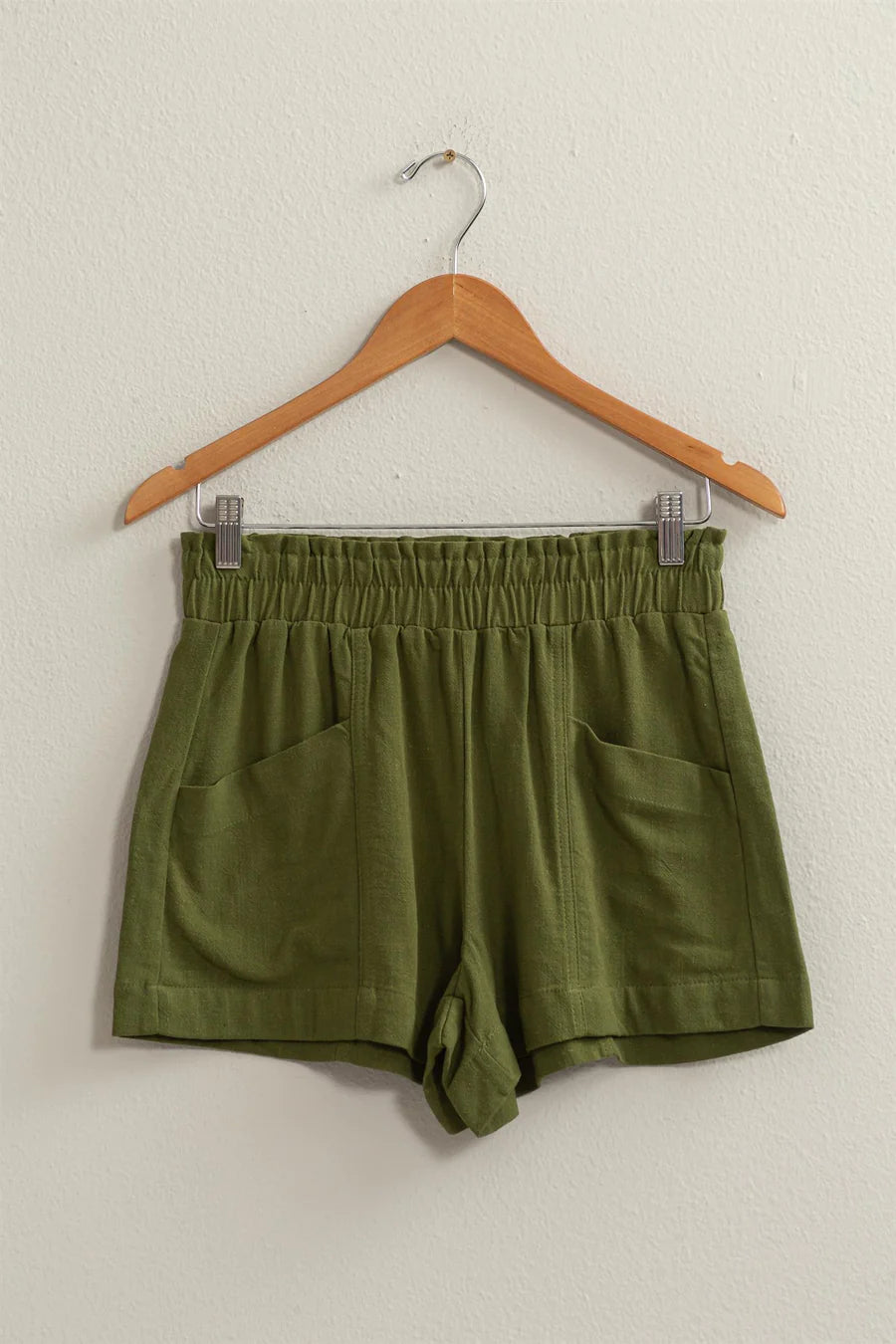 zoomed out view of Breezy linen blend shorts with an elasticated high waistband and side pockets, made from 80% rayon and 20% linen.