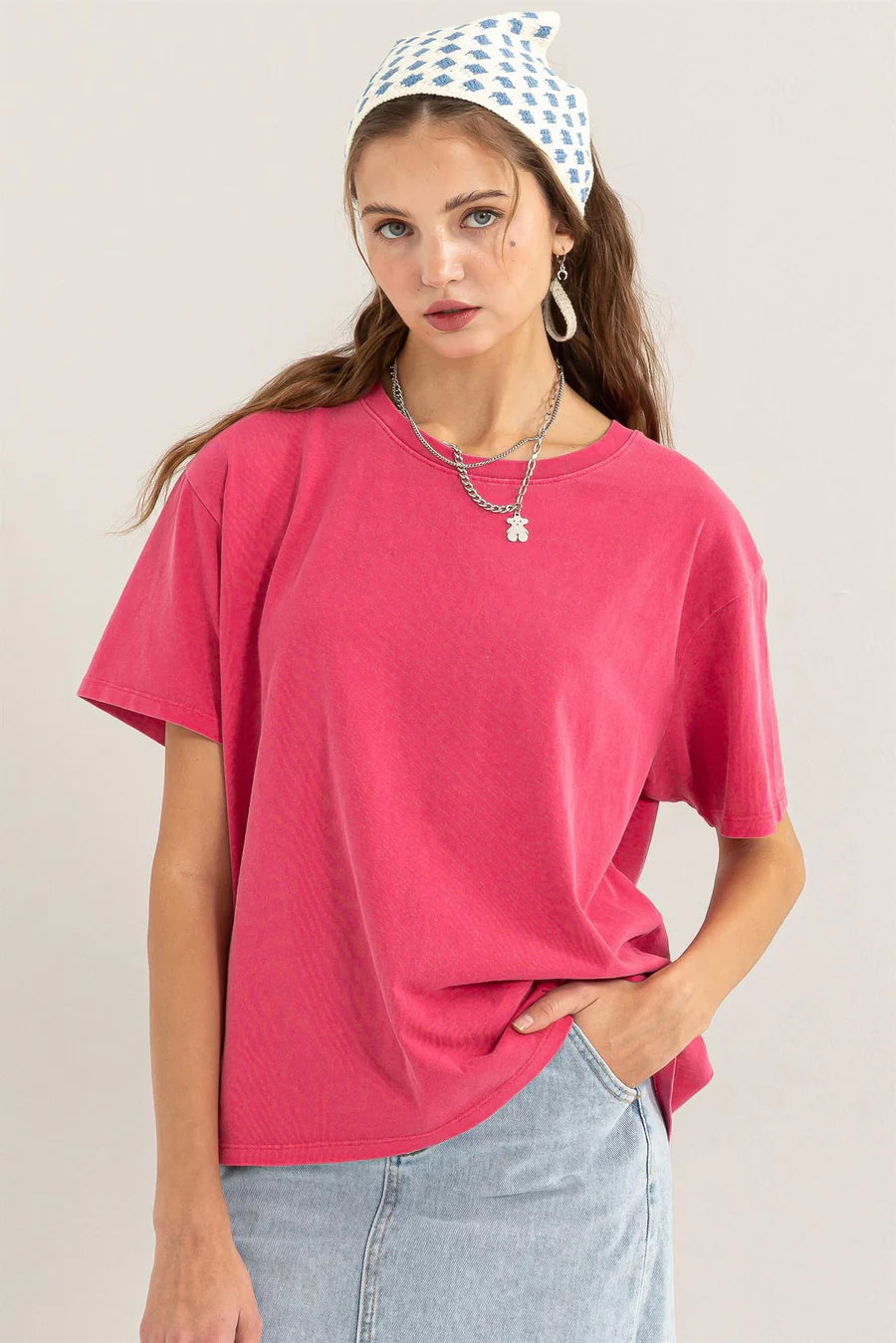 pink colored view of Rita Short Sleeve Tee with a crew neckline and short sleeves, featuring a relaxed fit. Made from 100% cotton for comfort.