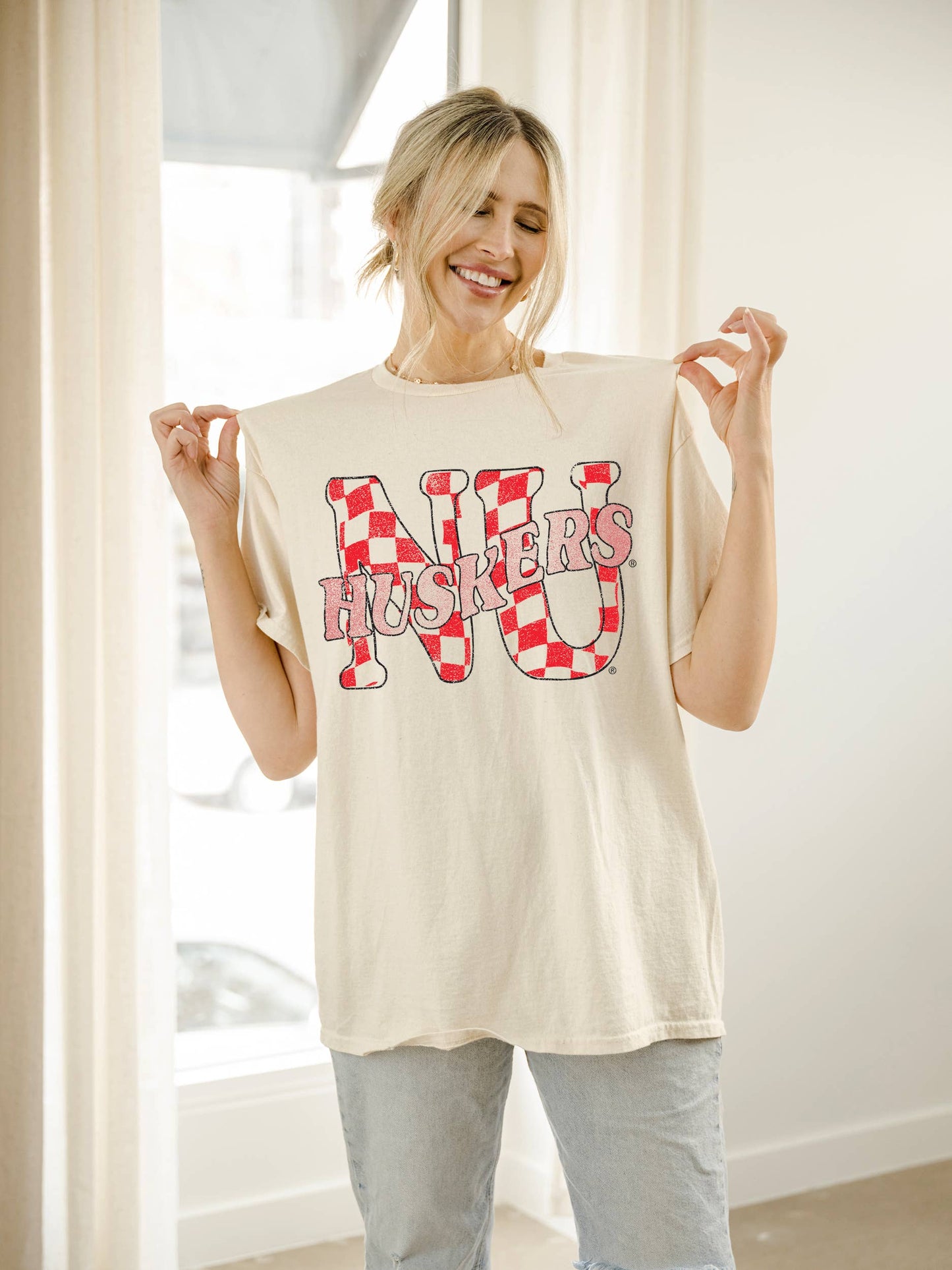 Nebraska Huskers Twisted Check Off White Thrifted Tee - Vintage inspired with unique distressing, made from 100% preshrunk cotton. Officially licensed and perfect for Game Day.