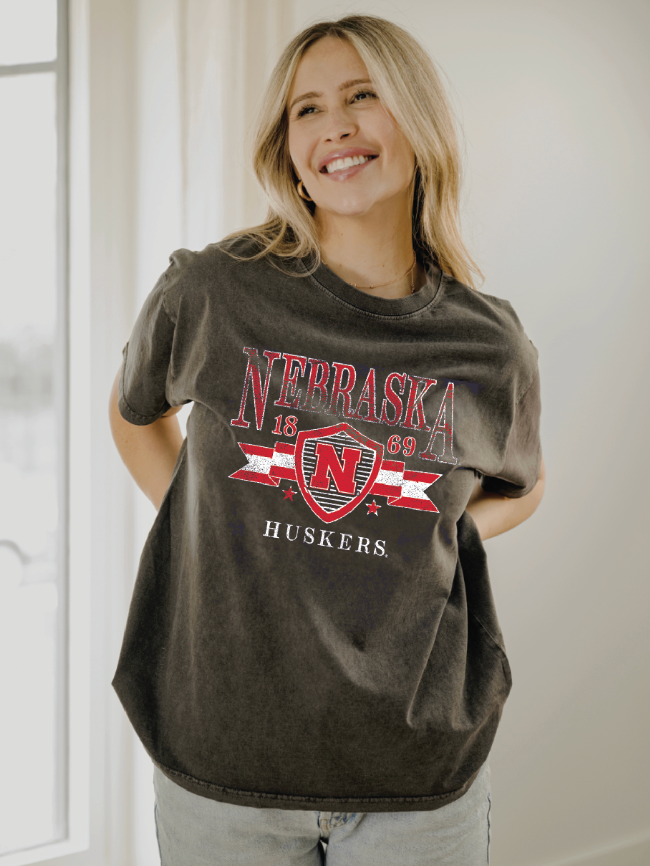 Nebraska Huskers Pep Rally Black Thrifted Tee - Vintage-inspired with unique distressing, made from 100% preshrunk cotton. Officially licensed and ideal for Game Day.