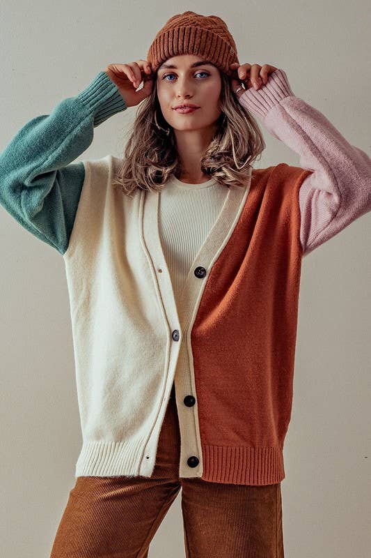 sleeve detail of Hailee Multicolor Cardigan Sweater with button-down front, colorful ribbed cuffs and hem, designed for a slightly oversized fit, available at Onyx Native.