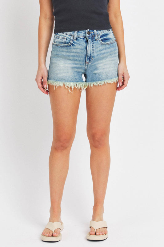 High Rise Mom Shorts in tinted denim with a frayed hem, high-waist design, belt loops, and zip fly. Made from 99% cotton and 1% spandex.