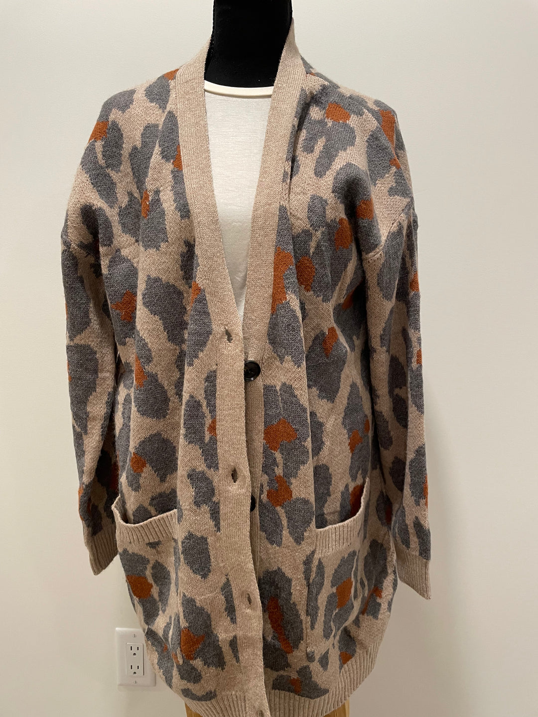 mannequin view of Button Down Leopard Oversize Cardigan in Mocha, made from 100% acrylic fabric.