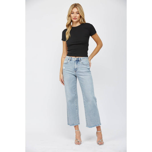 High-rise ankle wide-leg jeans in light wash with minimal distressing. Made from 98% cotton and 2% spandex.