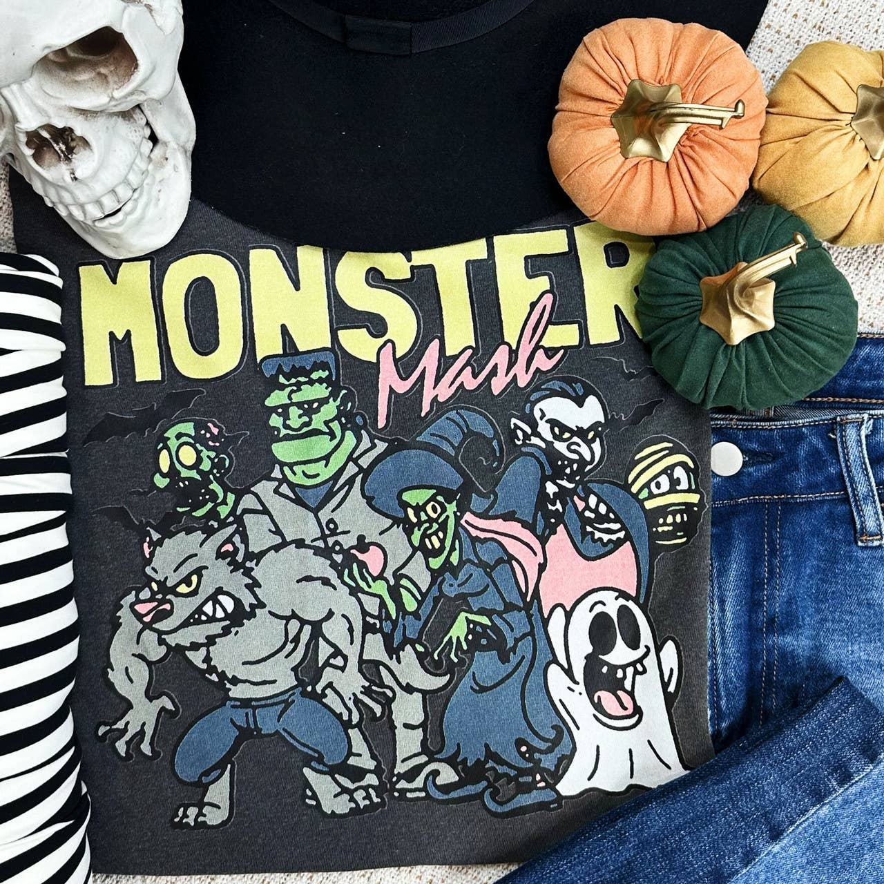 Monster Mash pigment dyed tee in pepper color with heat-pressed decoration. Made from 100% US ring spun cotton with a soft-washed, garment-dyed finish, featuring a classic rib collar and double-needle hems.