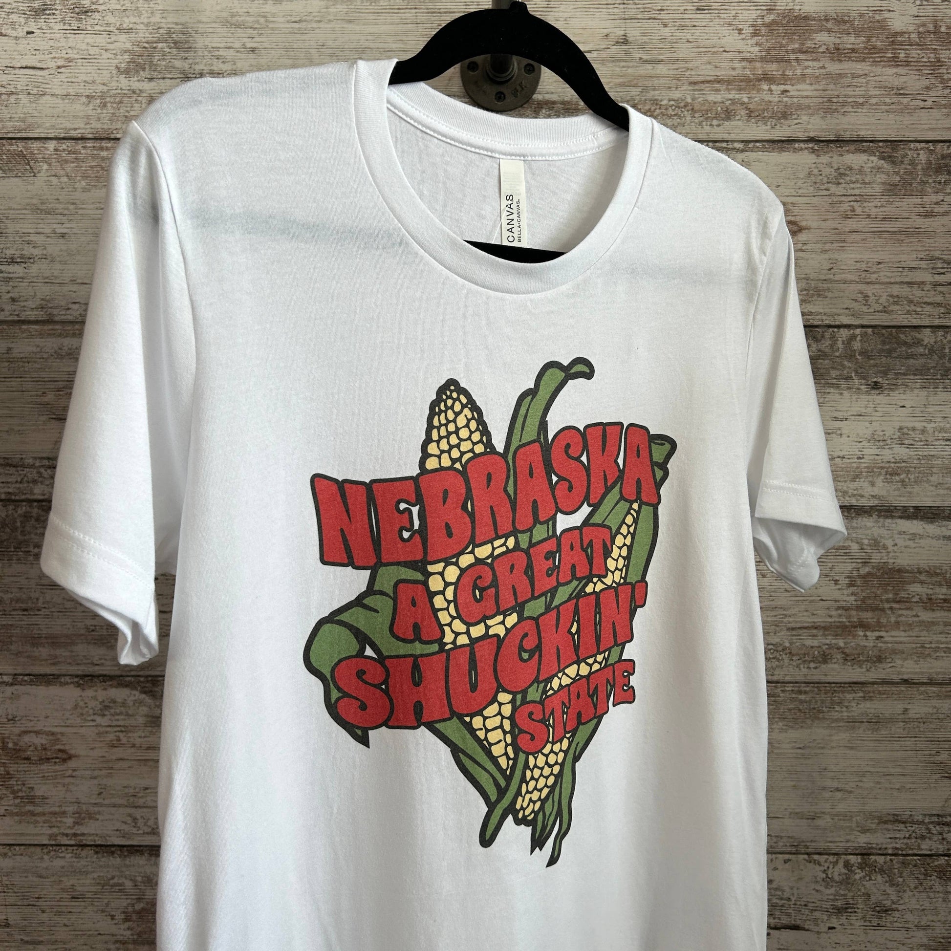 Nebraska Great Shuckin' State Graphic Tee - Bella Canvas, 52% cotton, 48% polyester, unisex fit, white sublimation print