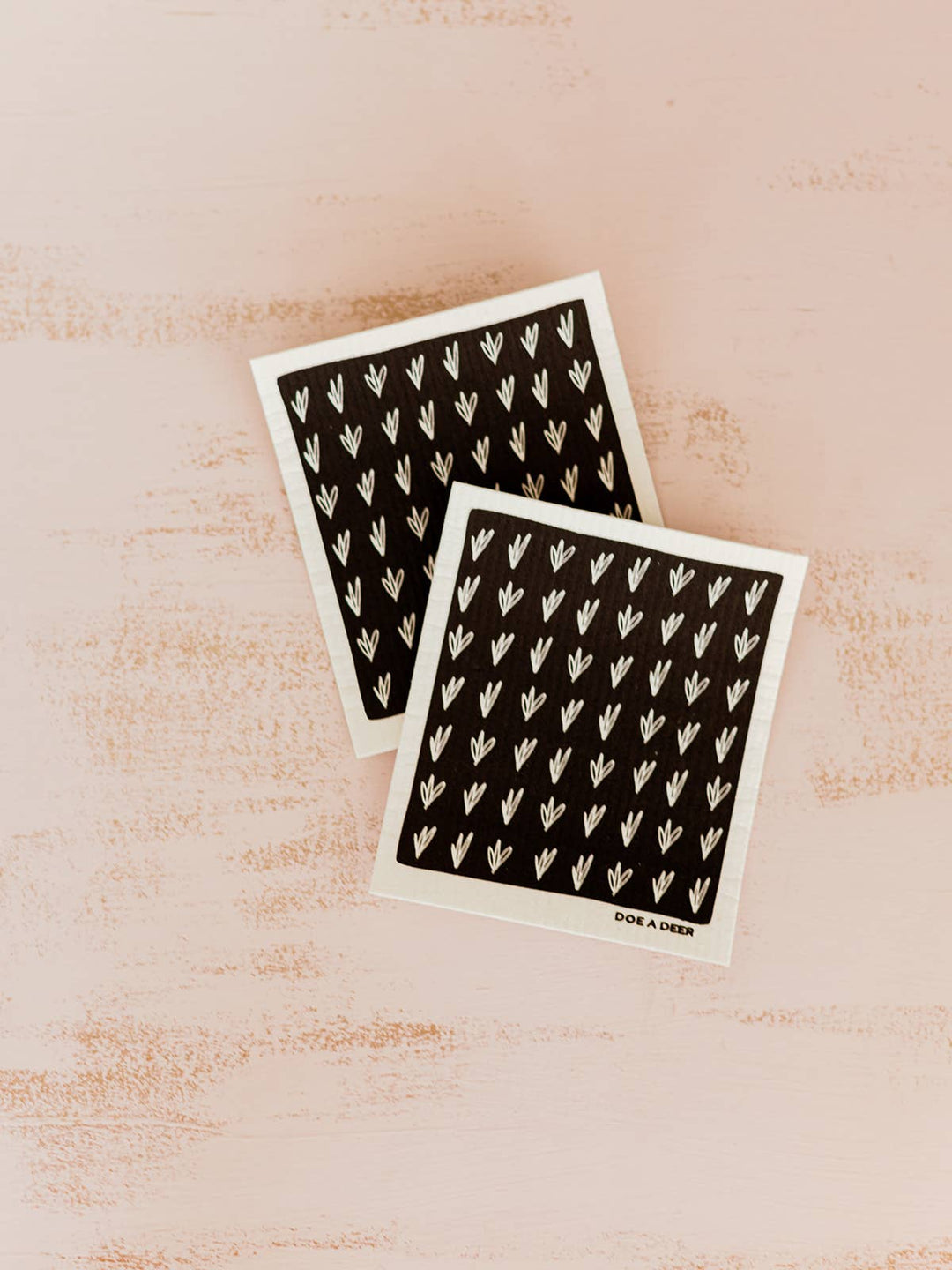 Hand-illustrated Swedish dishcloth with water-based ink designs. Made from 80% biodegradable cellulose and 20% natural cotton. Perfect for cleaning dishes and countertops.