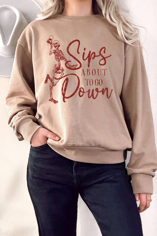 SKELETTI SIPS WINE ABOUT TO GO DOWN GRAPHIC TERRY SWEATSHIRT: TAN